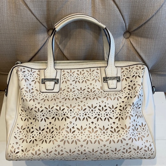 Coach Taylor Perforated Putty White Leather Satchel
12"L x 4.5"W x 8"H - Picture 1 of 11